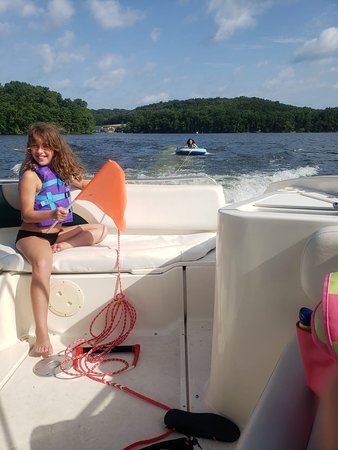 Tubing behind a boat at Lake of the Ozarks